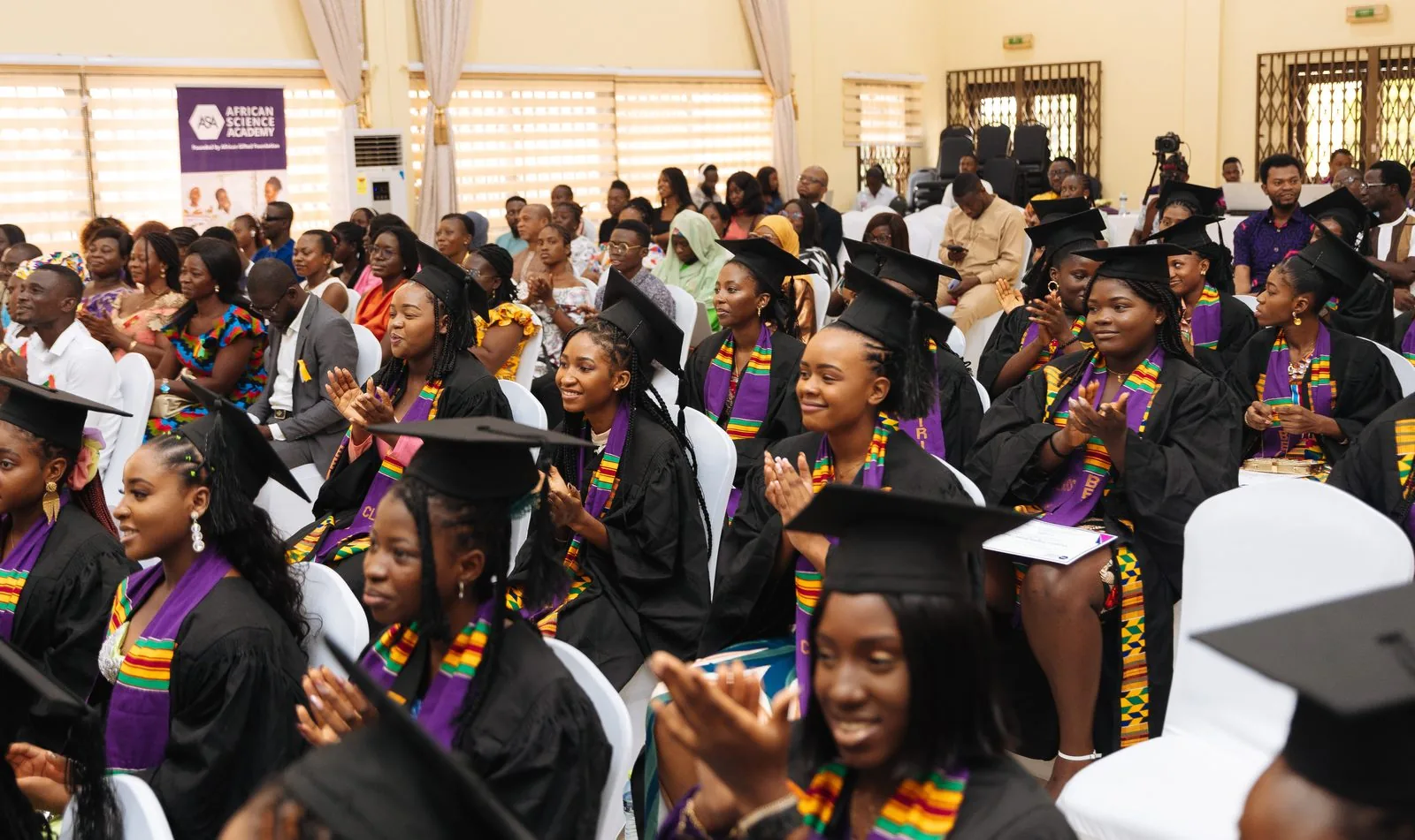 ASA graduates applauding at their graduation ceremony